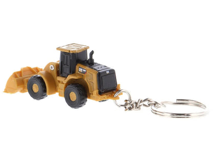 CAT Caterpillar 950M Wheel Loader Keychain Yellow Diecast Model by Masters <h2>CAT Masters</h2> <p>High-quality car perfect for collectors and enthusiasts. Features detailed interior exterior craftsma