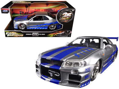 Brian's Nissan GTR Skyline R34 RHD (Right Hand Drive) Silver with Blue Stripes "Fast & Furious 25th Anniversary" 1/24 Diecast Model Car by Jada <h2>Brian's Jada</h2> <p>High-quality perfect for collec