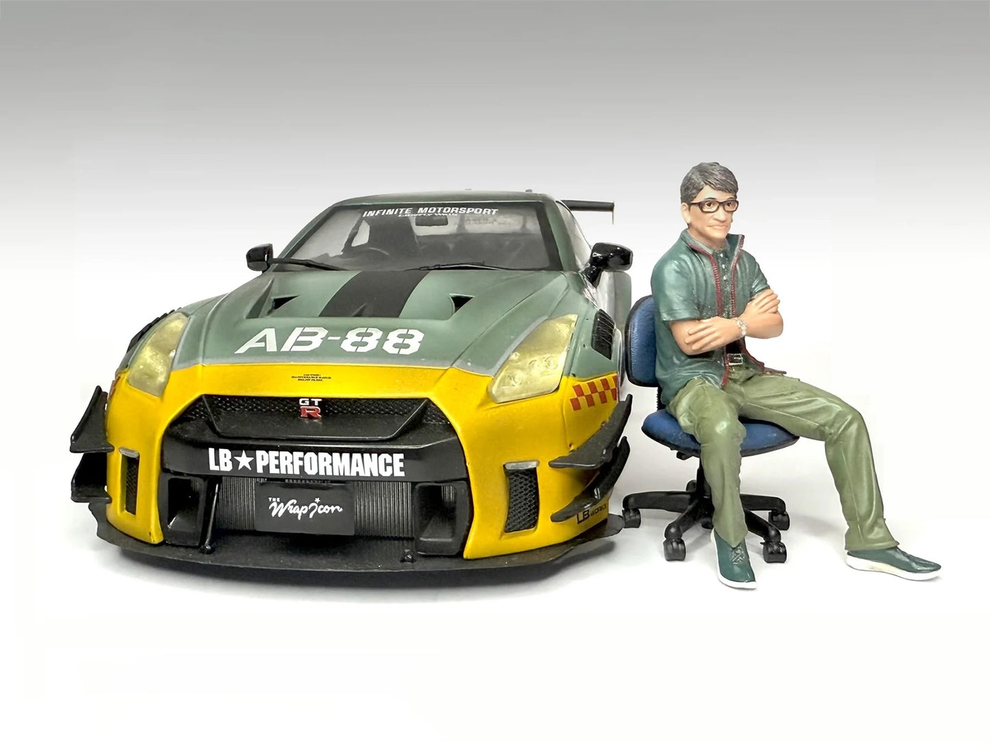 "Top Tuners" Figure #1 "Premium" Series for 1/18 Scale Models by American Diorama <h2>"Top Diorama</h2> <p>High-quality diecast model car perfect collectors and enthusiasts. Features detailed interior