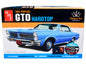 Skill 2 Model Kit 1965 Pontiac GTO Hardtop "Craftsman Plus" Series 1/25 Scale by AMT <h2>Skill AMT</h2> <p>High-quality diecast car perfect for collectors and enthusiasts. Features detailed interior e