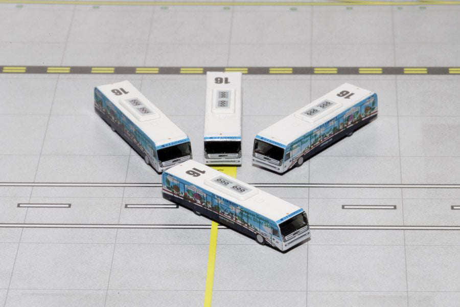 Cobus 3000 Passenger Bus White and Blue with Graphics "US Airways Shuttle - Greener Transit" 4 Piece Set 1/400 Diecast Models by GeminiJets <h2>Cobus GeminiJets</h2> <p>High-quality model car perfect
