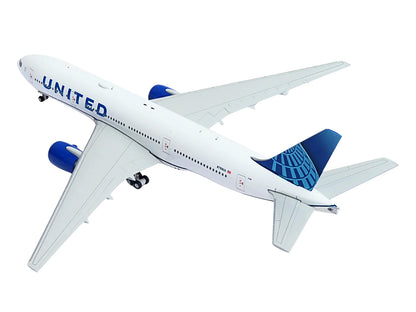 Boeing 777-200ER Commercial Aircraft "United Airlines" (N798UA) White with Blue Tail 1/400 Diecast Model Airplane by GeminiJets <h2>Boeing GeminiJets</h2> <p>High-quality car perfect for collectors an