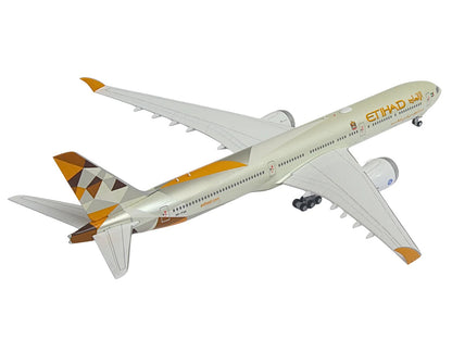 Boeing 777-9 Commercial Aircraft "Etihad Airways" (A6-FAA) Beige with Tail Graphics 1/400 Diecast Model Airplane by GeminiJets <h2>Boeing GeminiJets</h2> <p>High-quality car perfect for collectors and