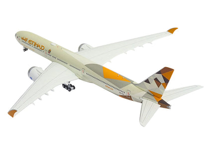 Boeing 777-9 Commercial Aircraft "Etihad Airways" (A6-FAA) Beige with Tail Graphics 1/400 Diecast Model Airplane by GeminiJets <h2>Boeing GeminiJets</h2> <p>High-quality car perfect for collectors and