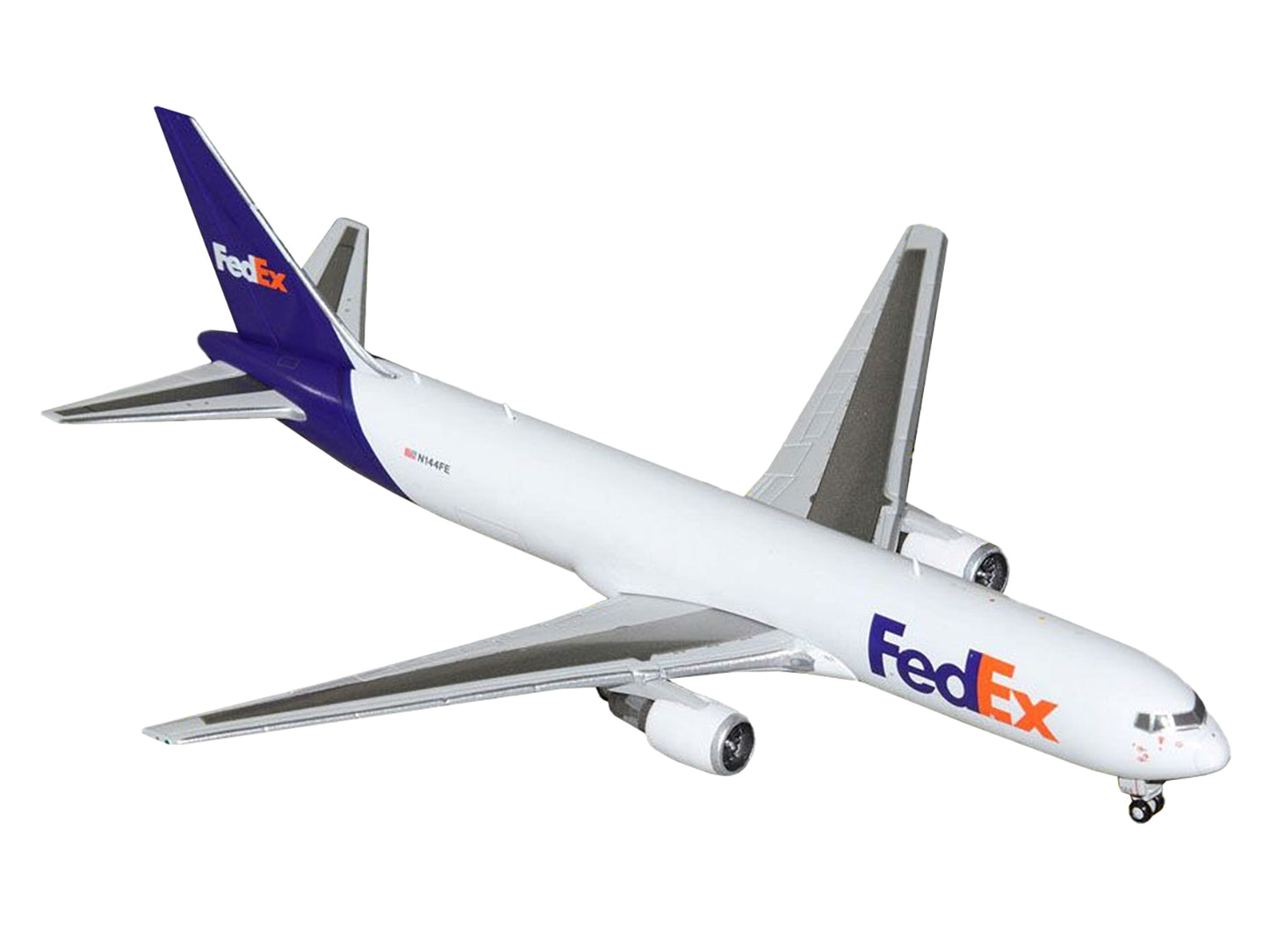 Boeing 767-300F Commercial Aircraft "FedEx (Federal Express)" (N144FE) White with Purple Tail 1/400 Diecast Model Airplane by GeminiJets <h2>Boeing GeminiJets</h2> <p>High-quality car perfect for coll