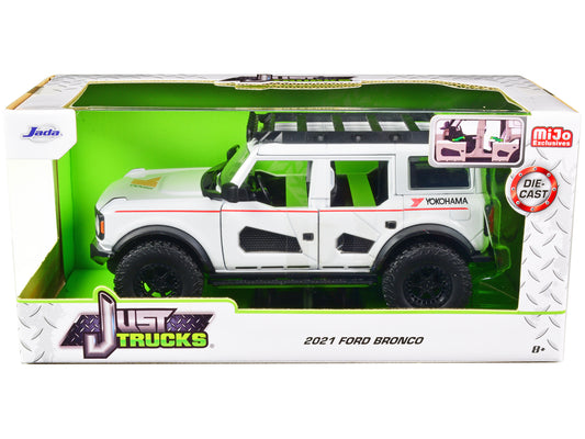 2021 Ford Bronco White with Red Stripes and Roof Rack "Yokohama Tires" "Just Trucks" Series 1/24 Diecast Model Car by Jada <h2>2021 Jada</h2> <p>High-quality perfect for collectors enthusiasts. Featur