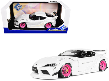 2025 T&yota GR Supra "Liberty Walk" Body Kit White Metallic with Pink Wheels 1/18 T&y Diecast Model Car by Solido