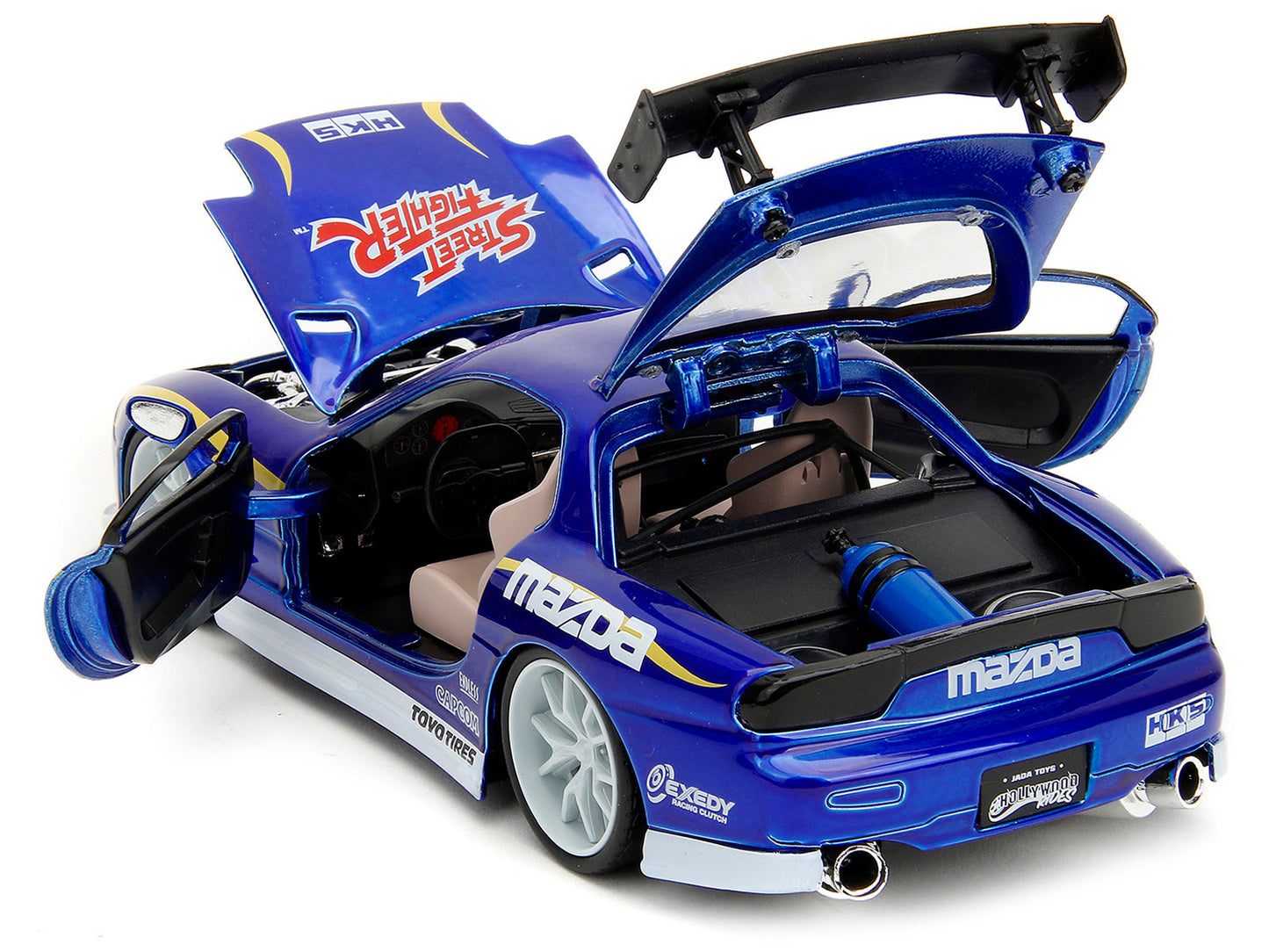 1993 Mazda RX-7 Candy Blue Metallic with Graphics and Chun-Li Diecast Figure "Street Fighter" Video Game "Anime Hollywood Rides" Series 1/24 Model Car by Jada <h2>1993 Jada</h2> <p>High-quality perfec