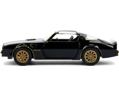 1977 Pontiac Firebird Black "Smokey and the Bandit" (1977) Movie "Hollywood Rides" Series 1/32 Diecast Model Car by Jada <h2>1977 Jada</h2> <p>High-quality perfect for collectors enthusiasts. Features