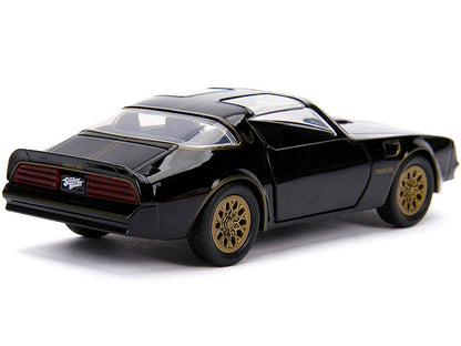 1977 Pontiac Firebird Black "Smokey and the Bandit" (1977) Movie "Hollywood Rides" Series 1/32 Diecast Model Car by Jada <h2>1977 Jada</h2> <p>High-quality perfect for collectors enthusiasts. Features