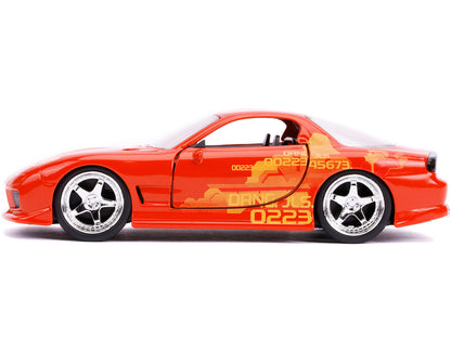 Orange Julius' Mazda RX-7 Metallic with Graphics "Fast & Furious" Series 1/32 Diecast Model Car by Jada <h2>Orange Jada</h2> <p>High-quality perfect for collectors and enthusiasts. Features detailed i