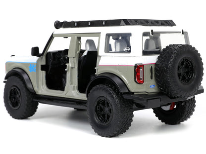 2021 Ford Bronco Gray and White with Matt Black Hood Roof Rack "M2 Motoring" "Just Trucks" Series 1/24 Diecast Model Car by Jada <h2>2021 Jada</h2> <p>High-quality perfect for collectors enthusiasts.