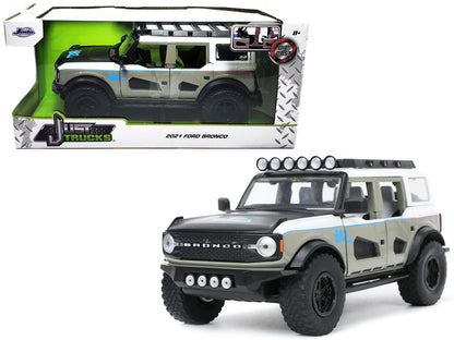 2021 Ford Bronco Gray and White with Matt Black Hood Roof Rack "M2 Motoring" "Just Trucks" Series 1/24 Diecast Model Car by Jada <h2>2021 Jada</h2> <p>High-quality perfect for collectors enthusiasts.