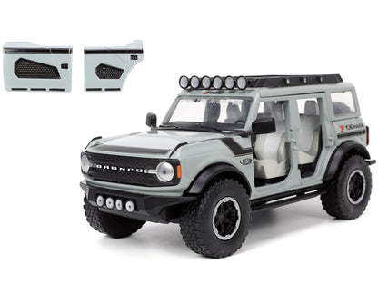 2021 Ford Bronco Gray with Black Stripes Roof Rack "Own the Night" "Just Trucks" Series 1/24 Diecast Model Car by Jada <h2>2021 Jada</h2> <p>High-quality perfect for collectors and enthusiasts. Featur