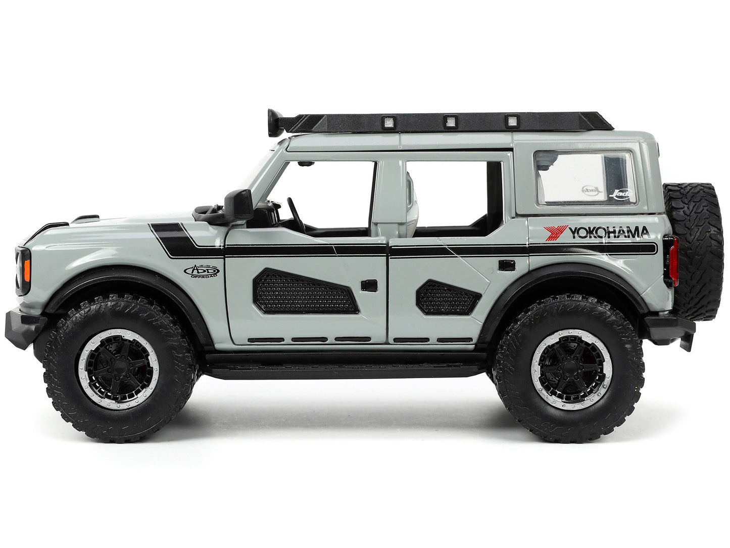 2021 Ford Bronco Gray with Black Stripes Roof Rack "Own the Night" "Just Trucks" Series 1/24 Diecast Model Car by Jada <h2>2021 Jada</h2> <p>High-quality perfect for collectors and enthusiasts. Featur