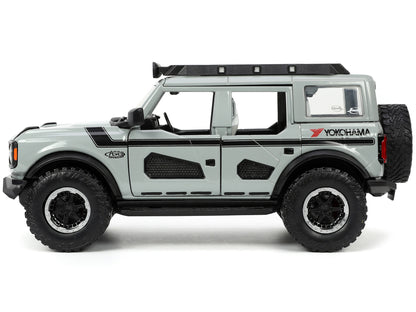 2021 Ford Bronco Gray with Black Stripes Roof Rack "Own the Night" "Just Trucks" Series 1/24 Diecast Model Car by Jada <h2>2021 Jada</h2> <p>High-quality perfect for collectors and enthusiasts. Featur