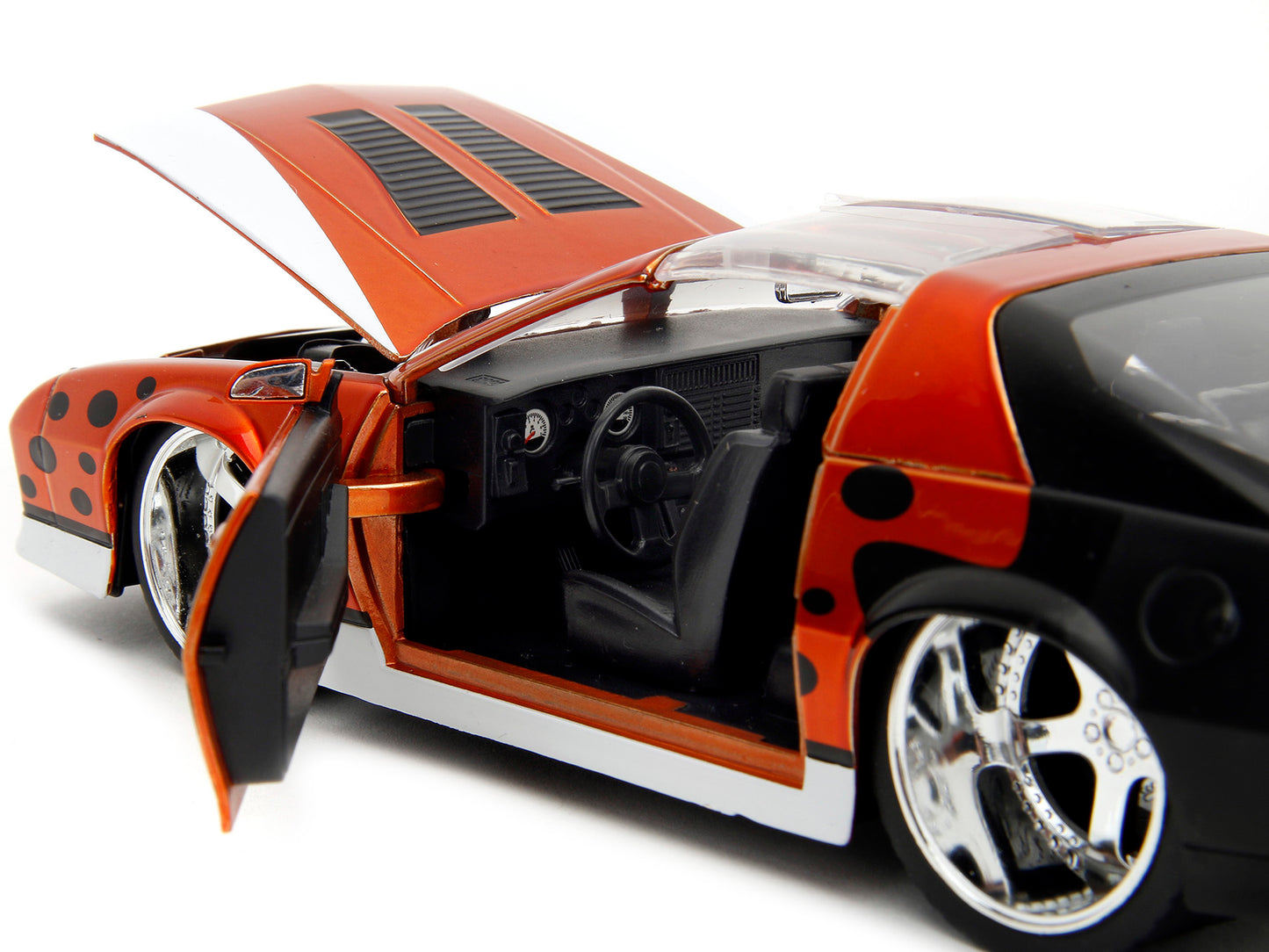 1985 Chevrolet Camaro Z/28 Orange Metallic with Graphics and Chester Cheetah Diecast Figure "Cheetos" "Hollywood Rides" Series 1/24 Model Car by Jada <h2>1985 Jada</h2> <p>High-quality perfect for col