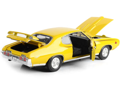 1969 Pontiac GTO Judge Yellow 1/18 Diecast Model Car by Motormax <h2>1969 Motormax</h2> <p>High-quality perfect for collectors and enthusiasts. Features detailed interior exterior craftsmanship, reali