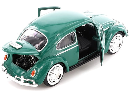 1966 Volkswagen Beetle Green 1/24 Diecast Model Car by Motormax <h2>1966 Motormax</h2> <p>High-quality perfect for collectors and enthusiasts. Features detailed interior exterior craftsmanship, realis