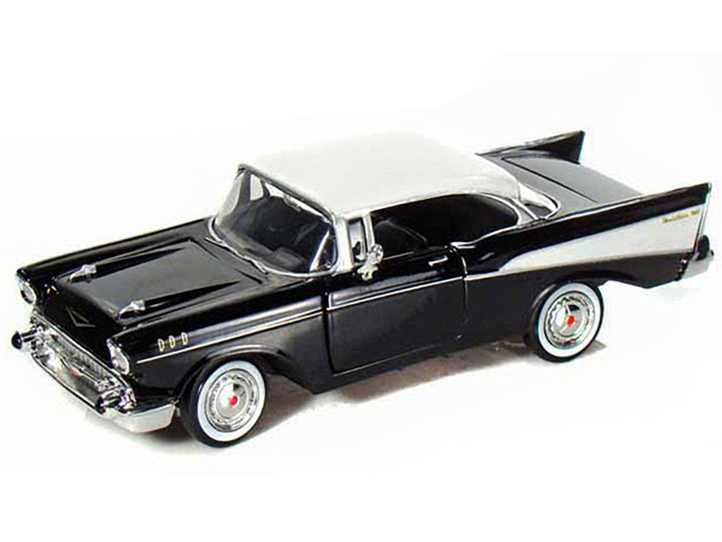 1957 Chevrolet Bel Air Black with White Top 1/24 Diecast Model Car by Motormax <h2>1957 Motormax</h2> <p>High-quality perfect for collectors and enthusiasts. Features detailed interior exterior crafts
