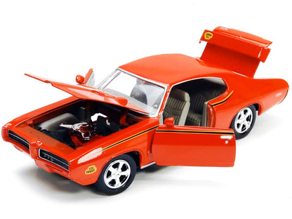 1969 Pontiac GTO Judge Orange with Stripes 1/24 Diecast Model Car by Motormax <h2>1969 Motormax</h2> <p>High-quality perfect for collectors and enthusiasts. Features detailed interior exterior craftsm