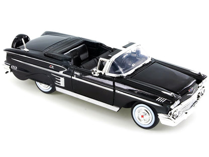 1958 Chevrolet Impala Convertible Black 1/24 Diecast Model Car by Motormax <h2>1958 Motormax</h2> <p>High-quality perfect for collectors and enthusiasts. Features detailed interior exterior craftsmans