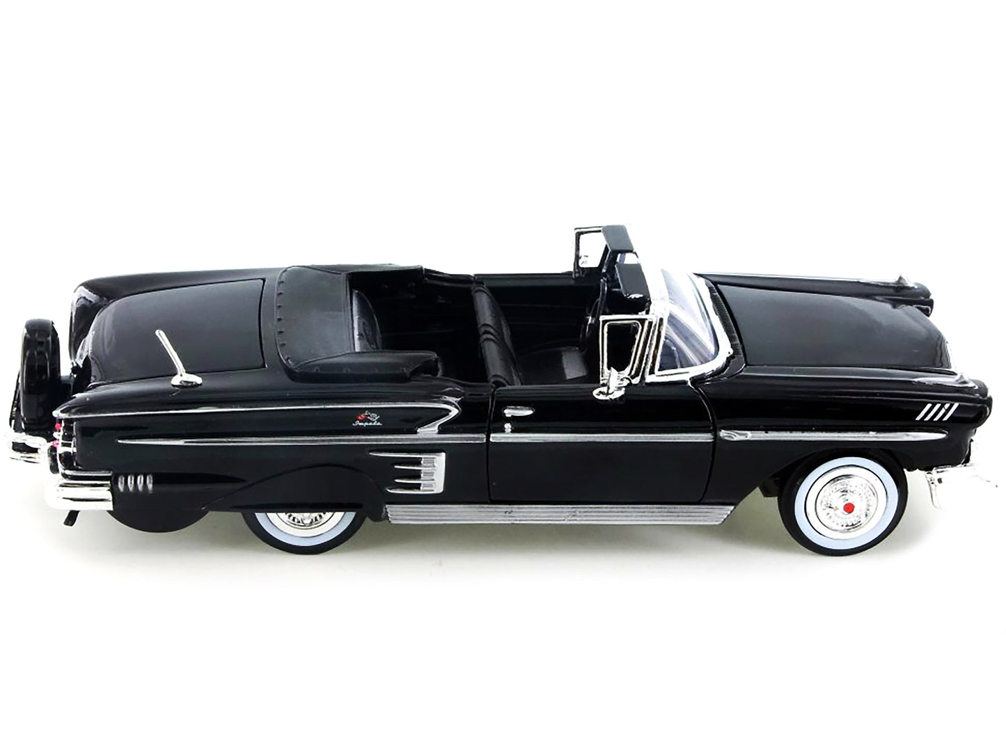1958 Chevrolet Impala Convertible Black 1/24 Diecast Model Car by Motormax <h2>1958 Motormax</h2> <p>High-quality perfect for collectors and enthusiasts. Features detailed interior exterior craftsmans